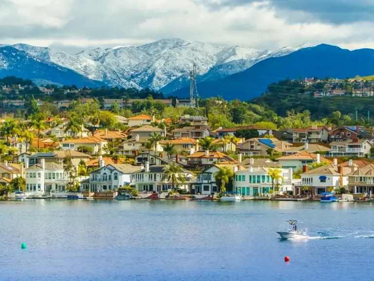 Lake Mission Viejo with snow capped Santa Ana Mountains